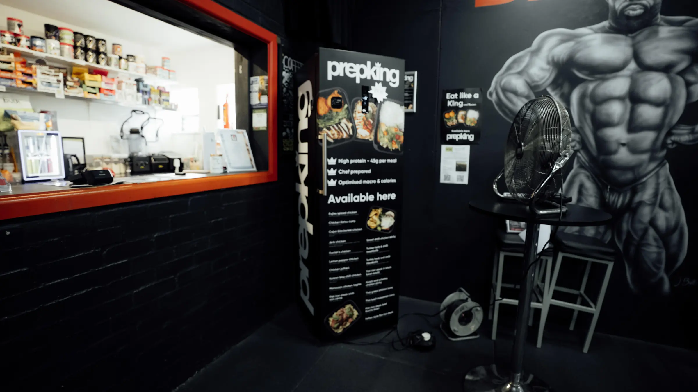 The nutrition bar hatch with the PrepKing meals stand beside it