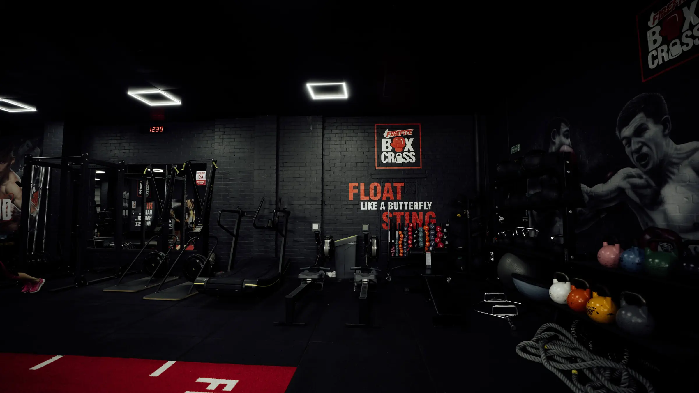 The functional area with the kettlebell rack and Float mural