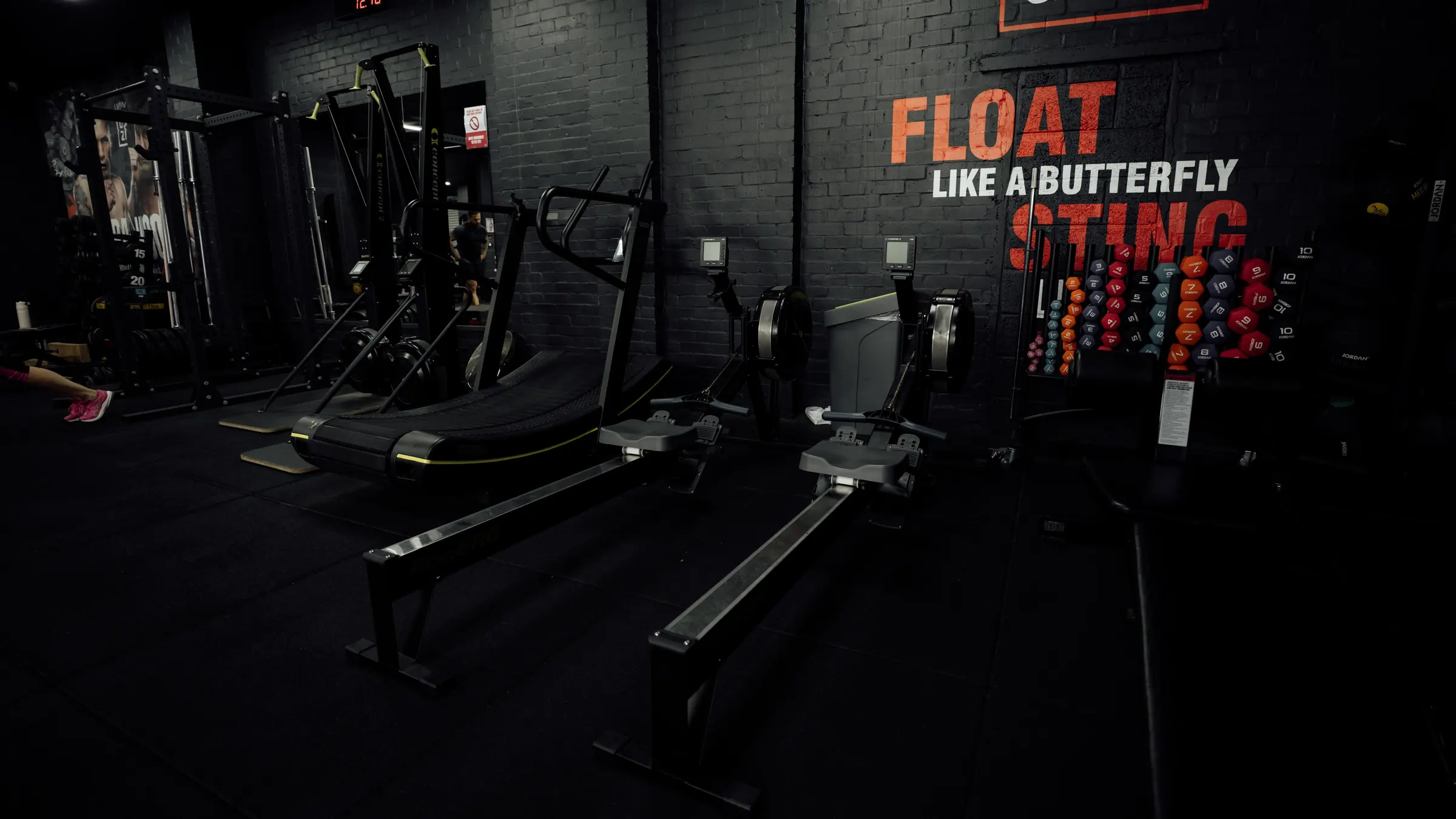 The Technogym Skillmill under the Float Like a Butterfly mural