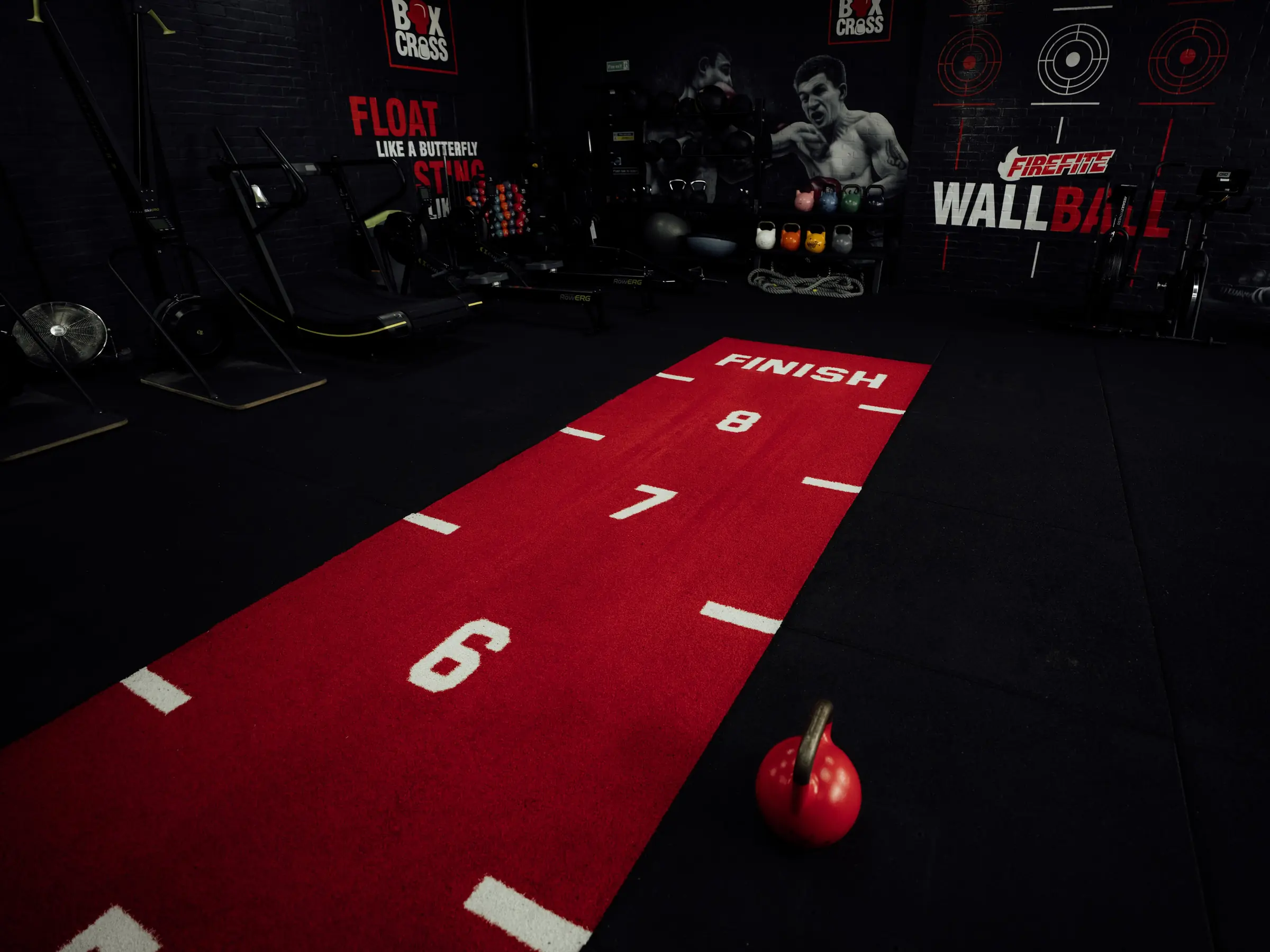 The finish line of the red sled track with a kettlebell