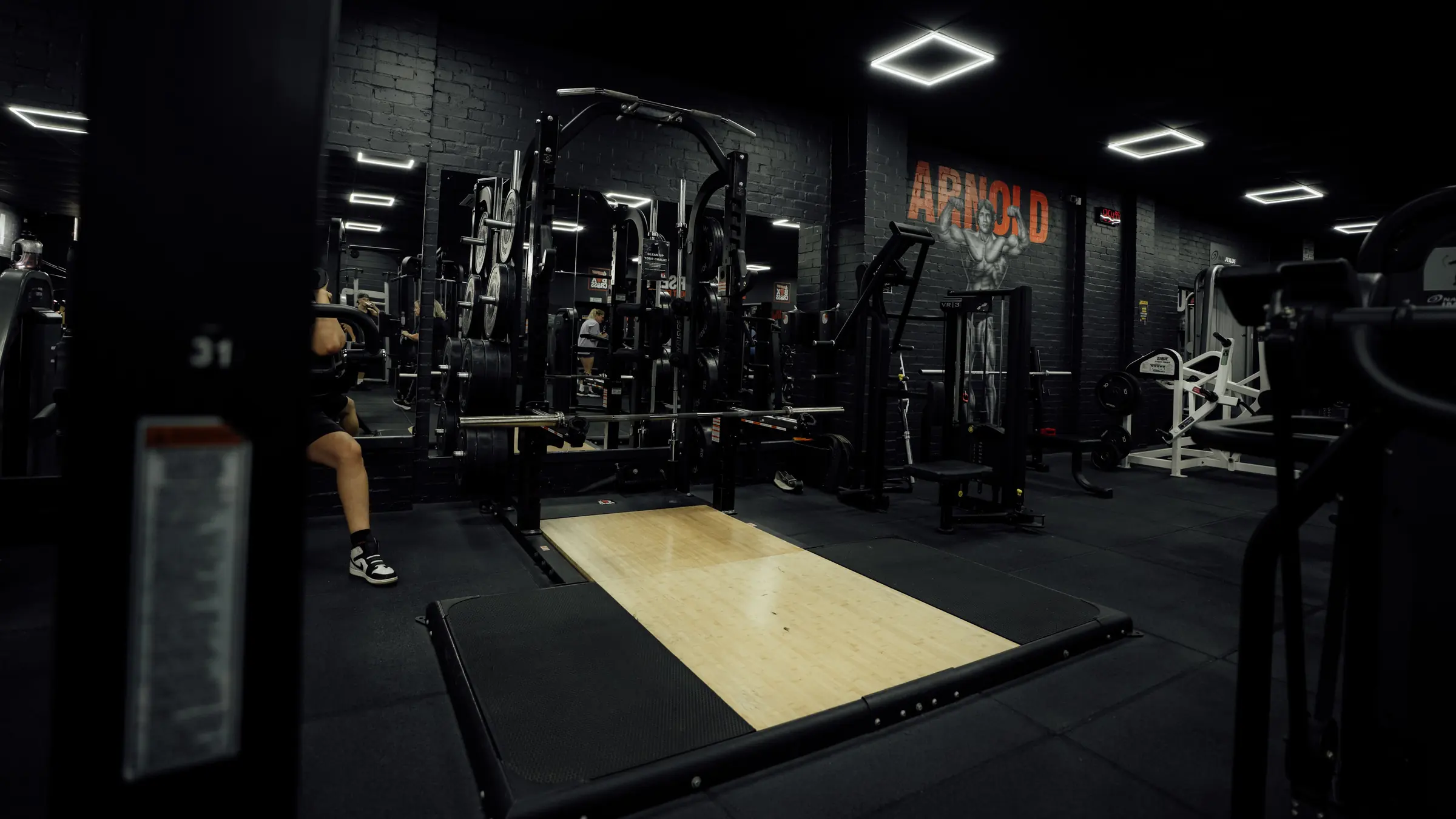 The lifting platform and rack in the free weight area