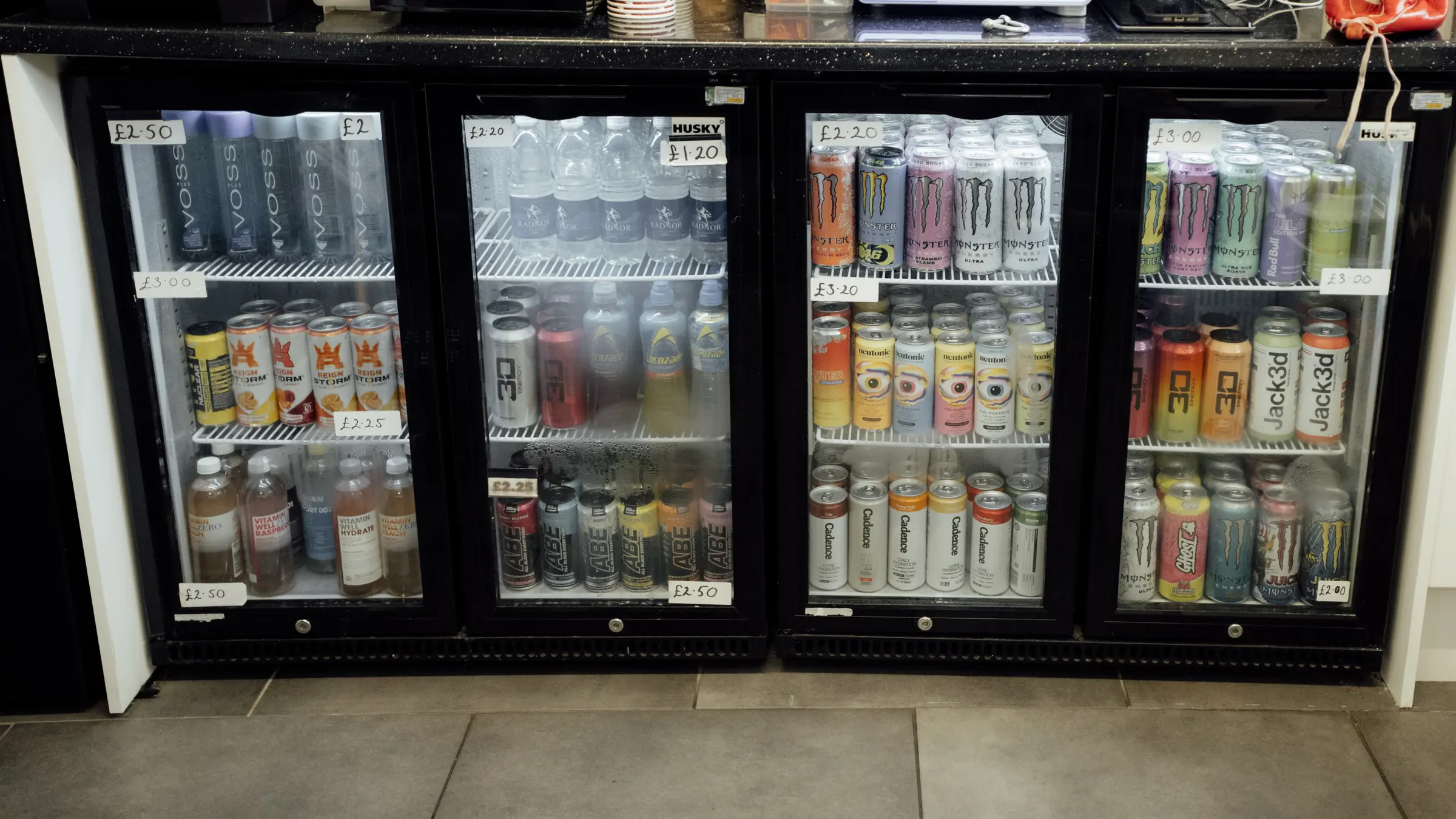 Drinks fridges stocked with energy drinks, water and protein drinks