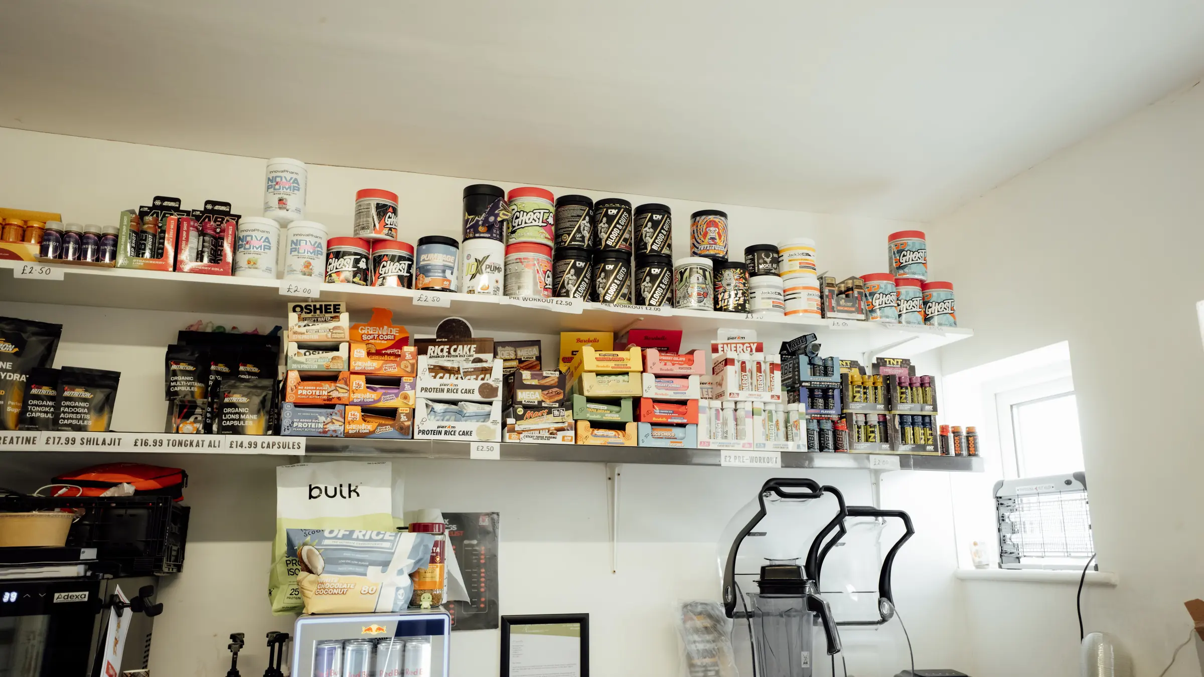 The supplement shelves and counter in the BoxCross shop